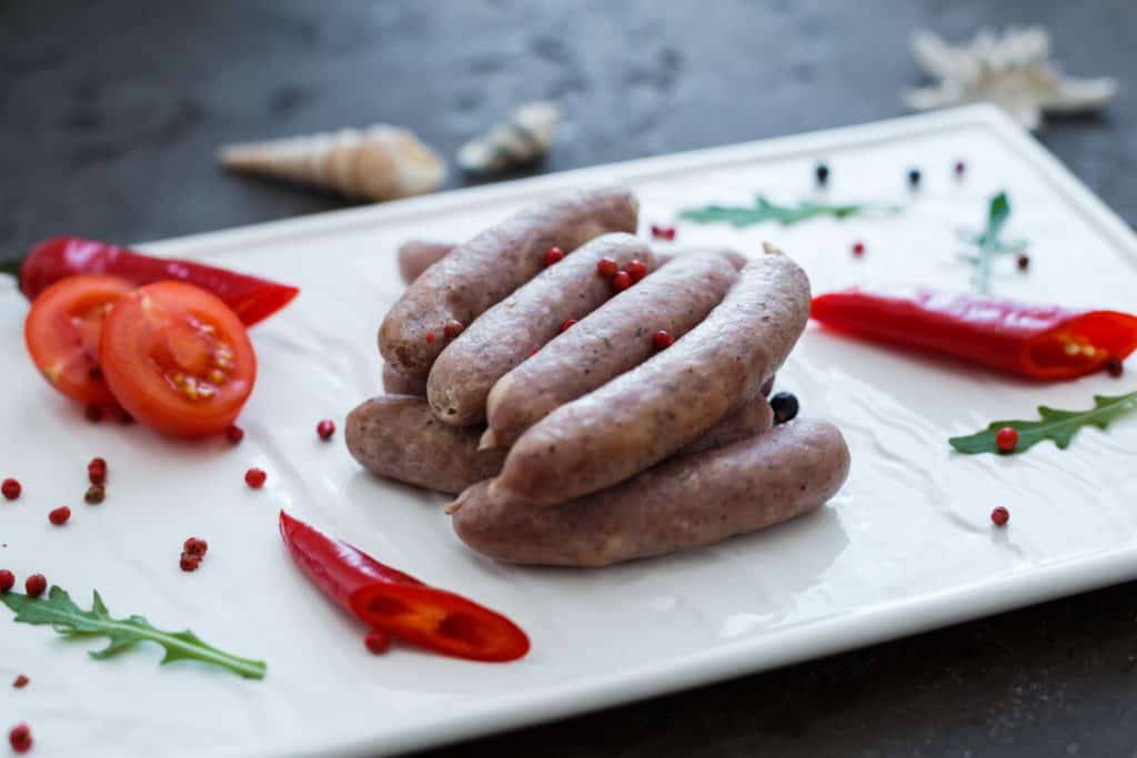 bratwurst on a white plate