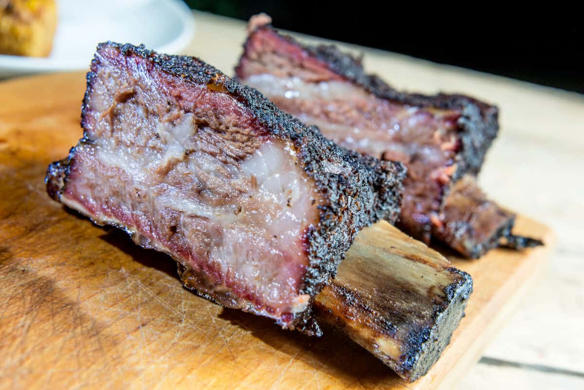 2 barbecued, very well marbled beef ribs