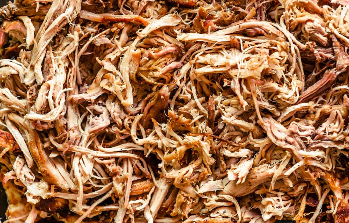 a large tray filled with pulled pork